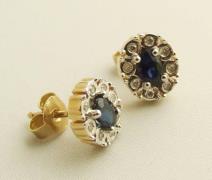 Christian Bicolor gouden oorbellen met diamant en saffier