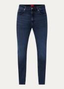 HUGO 708 slim fit jeans met donkere wassing