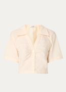 Sandro Cropped blouse met plooidetail en V-hals
