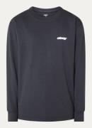 Obey Star longsleeve met logo- en backprint