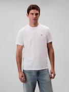 T-shirt met logo badge