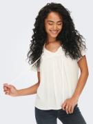 Blouse fluide, col volanté à nouer