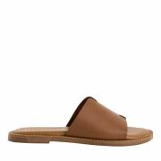 Mules plates en cuir