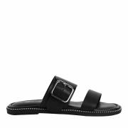 Mules plates en cuir
