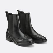 Bottines chelsea en cuir perforé