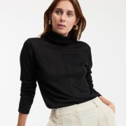 Pull col roulé en fine maille