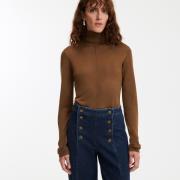 Pull col roulé en fine maille