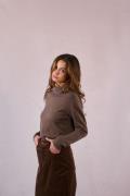 Pull col roulé boutonné